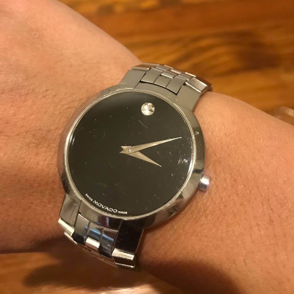 Movado Silver watch with black face